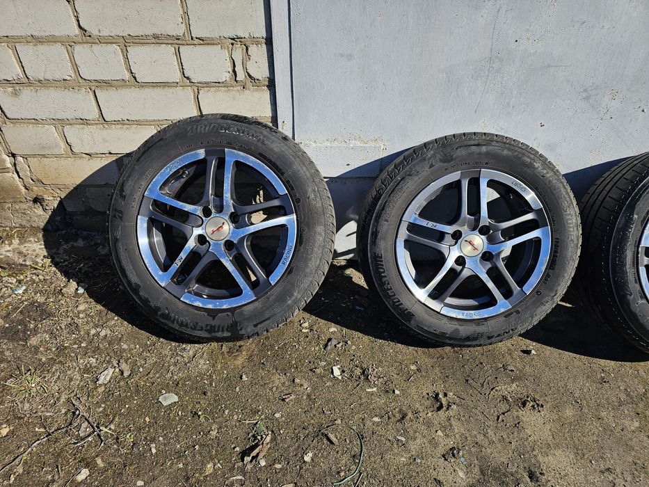 Продам легкосплавные диски с резиной R-14