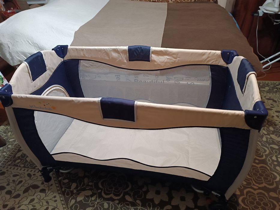Дитяче ліжечко-манеж Wonderkids. Стан нового.