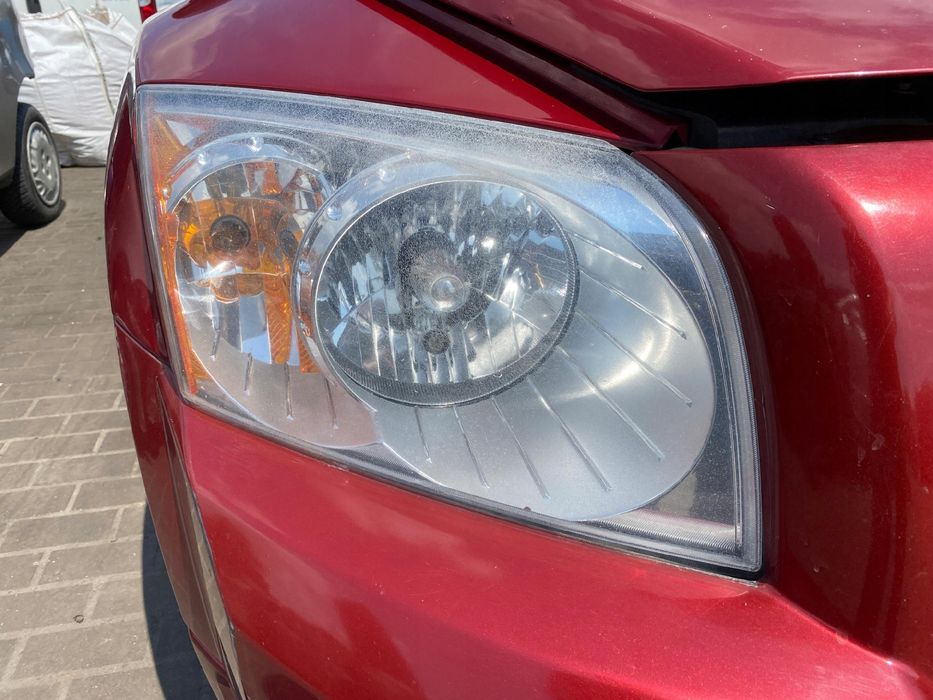 REFLEKTOR LAMPA PRAWA przednia przód Dodge Caliber 06-12