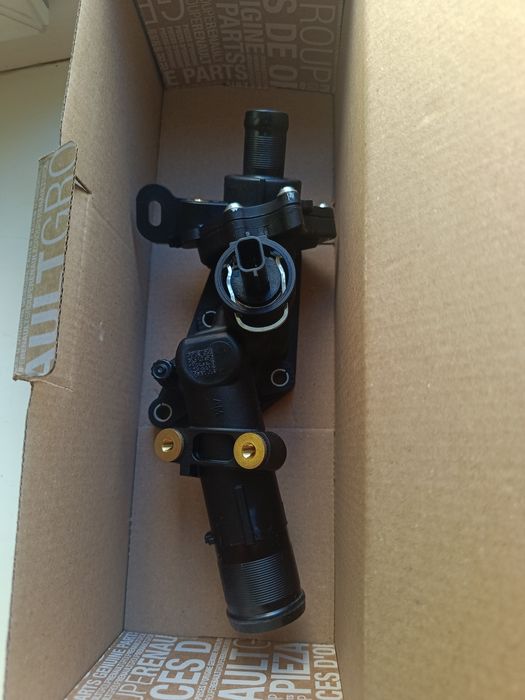 Продам новий оригінальний термостат на Рено Каджар