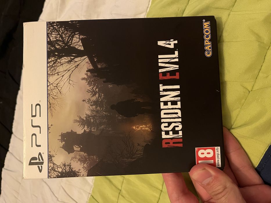 Edição especial capa metálica Resident Evil 4  PS5