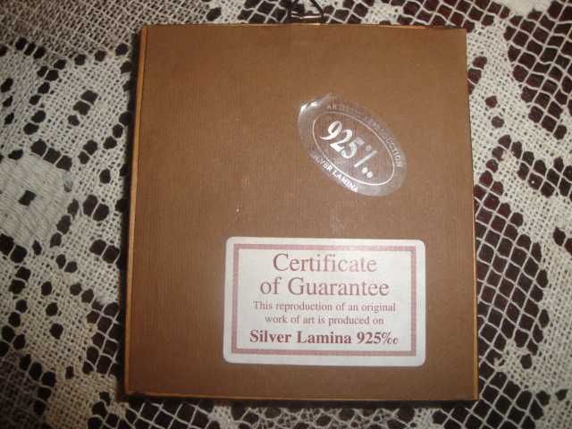 Mały obrazek w ramce z certyfikatem gwarancji wykonania