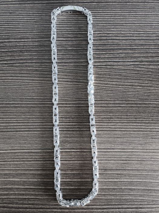 Łańcuszek męski stal szlachetna 56 cm. Waga 64,57g.