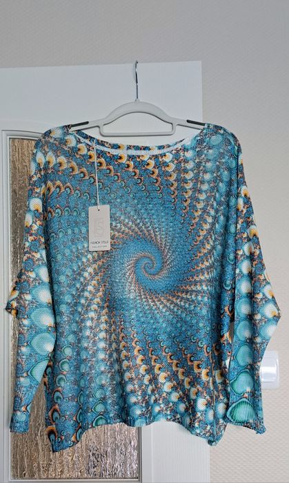 Sweterek niciak turkusowy