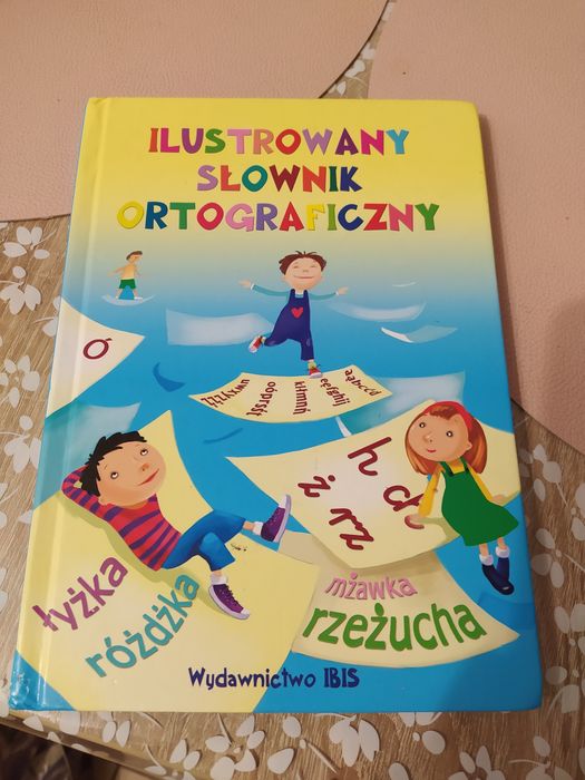 Gra liczmany, słownik ortograficzny i książka gang słodziaków