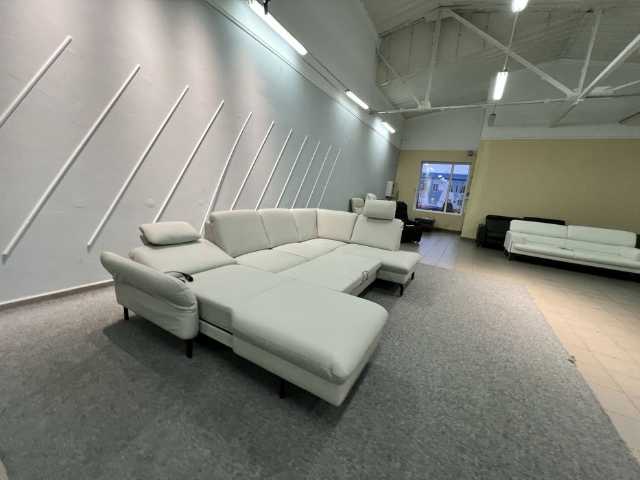 Виставковий новий шкіряний розкладний диван реклайнер