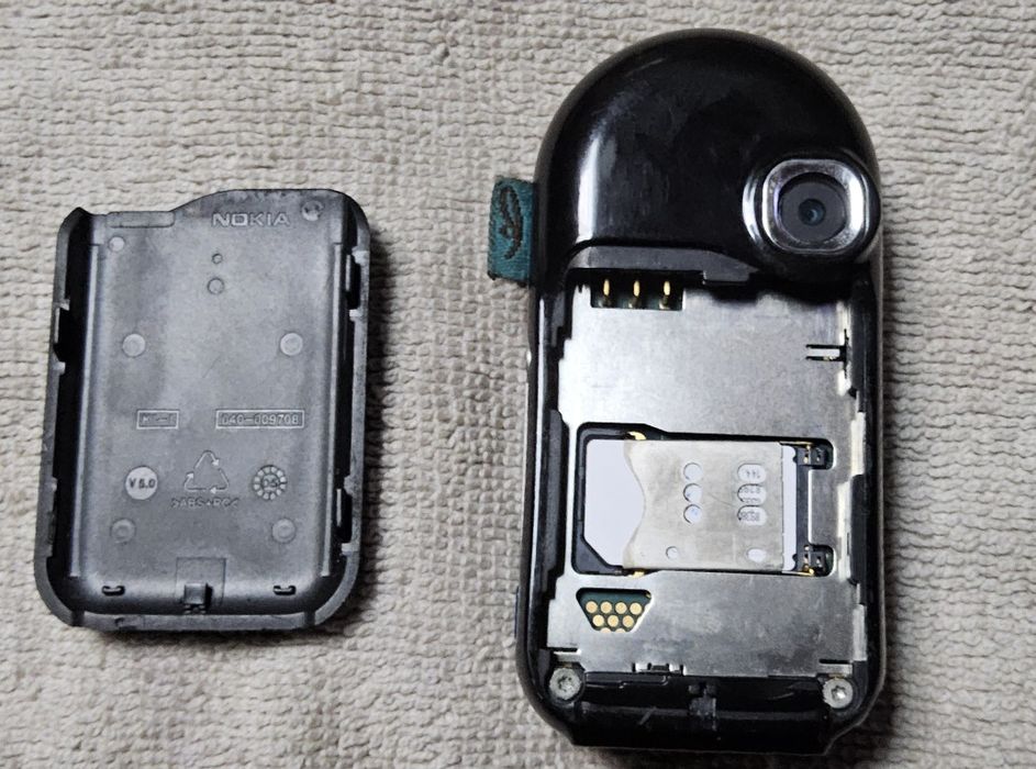 Мобильный телефон Nokia 7373,заряд,статуэтка,sharp,