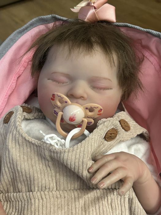 Baby reborn + carrinho como novo mais outros ver descricao