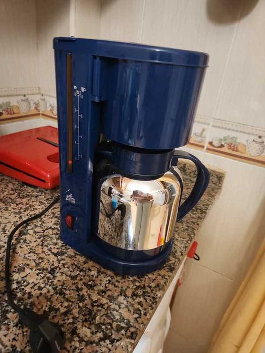 Máquina de café de filtros descartável