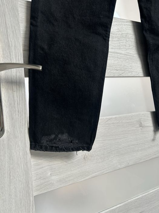 Spodnie jeansowe z przetarciami zara m