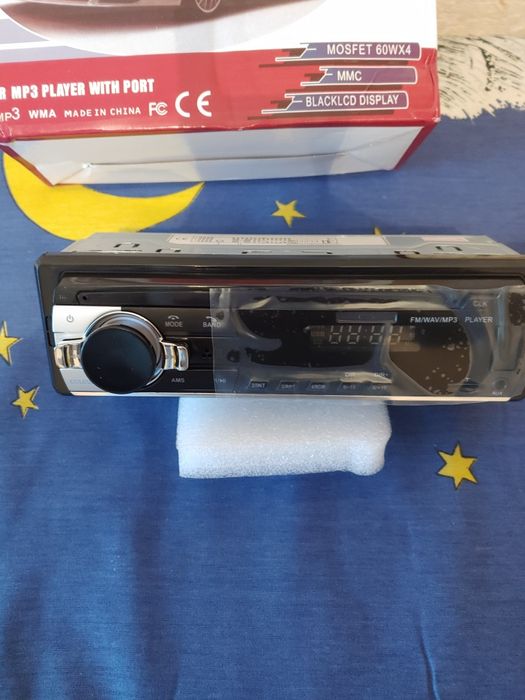 Бюджетна автомагнитола з USB,MP3,блютуз та пульт