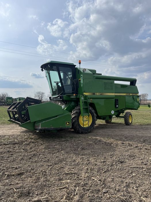 Свіжопривезений комбайн JOHN DEERE 1157 жатка Шумахер