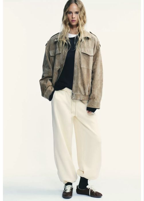 Спортивні  молочні штани Zara