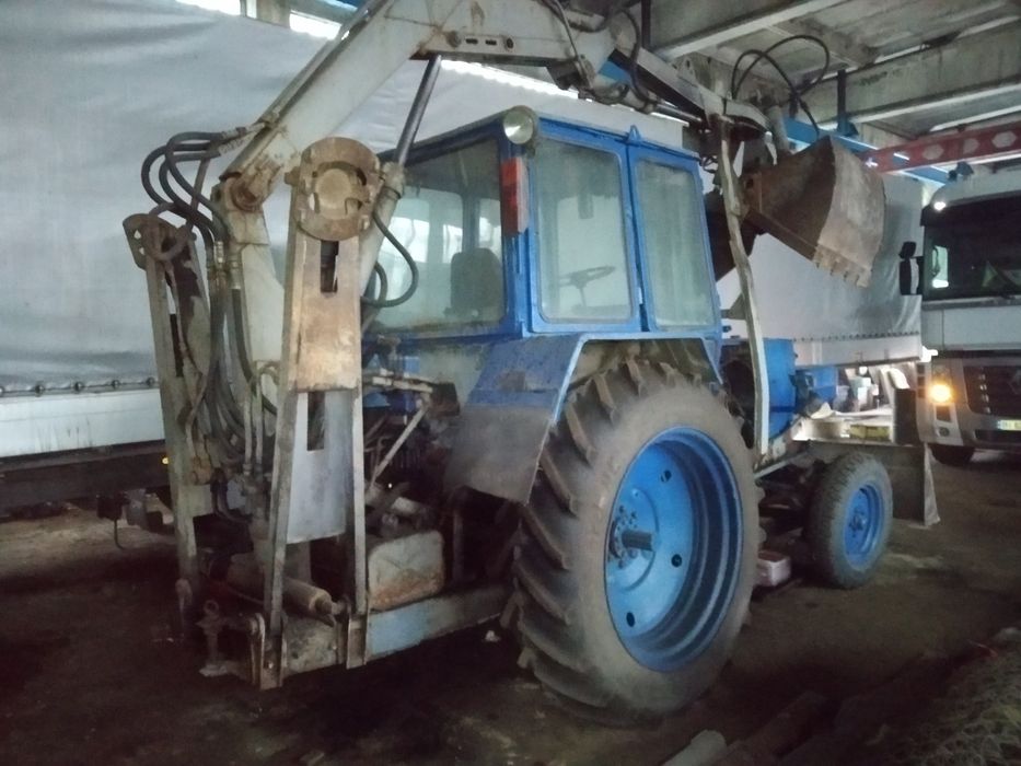 Грейферний погрузчик