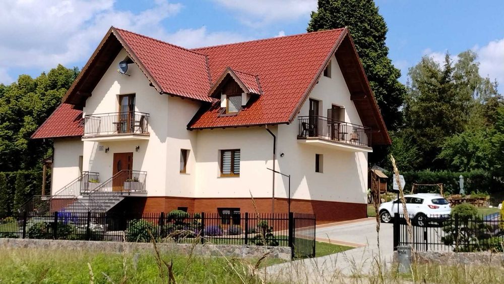 "Słoneczna Ostoja" Pokoje gościnne Apartamenty Mikołajki Mazury
