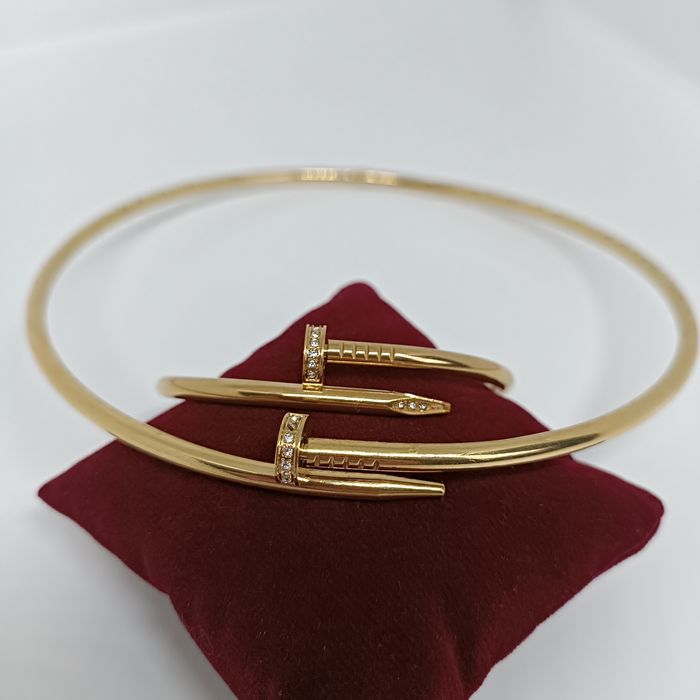 Набір прикрас жіночий: жорсткий чокер і браслет цвях  з цирконіями