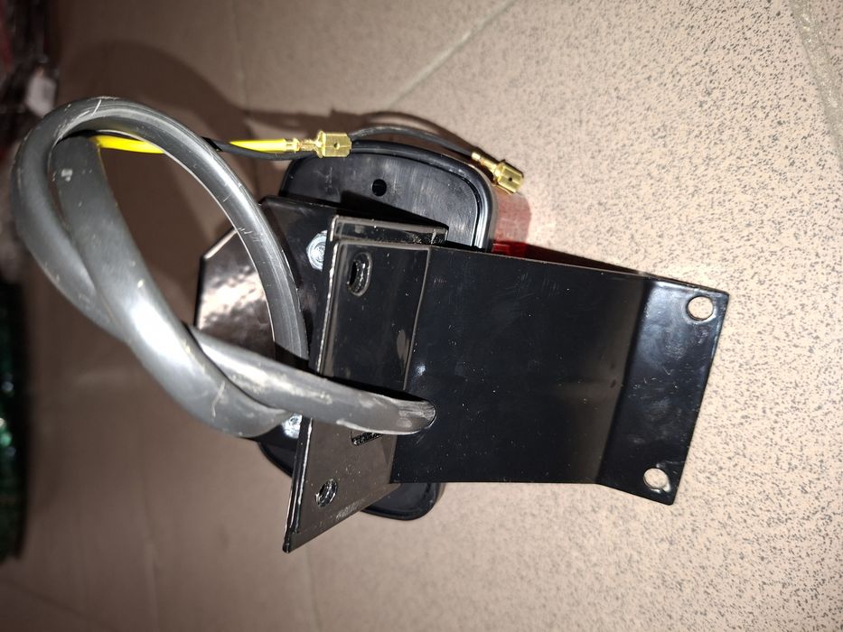 Nowy zestaw naprawczy lampa tyl+ chwyt mocowanie romet motorynka m1 pl