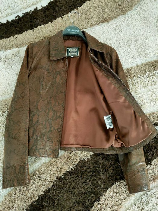 Casaco de couro castanho