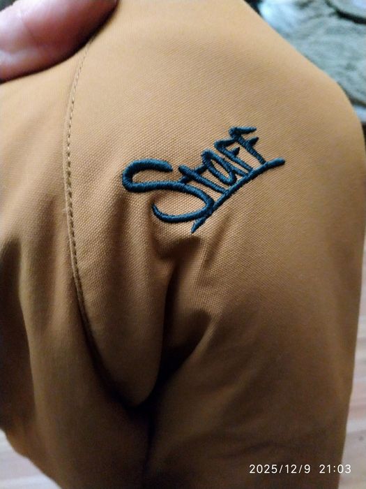 Коричнева чоловіча курточка