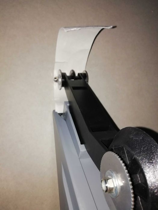 Aplicador de massa e banda de papel .