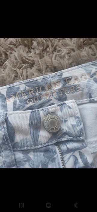Rybaczki jeans w piękne kwiaty 158