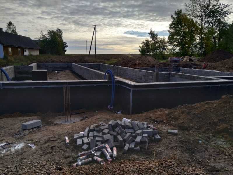 Ekipa murarzy budowy