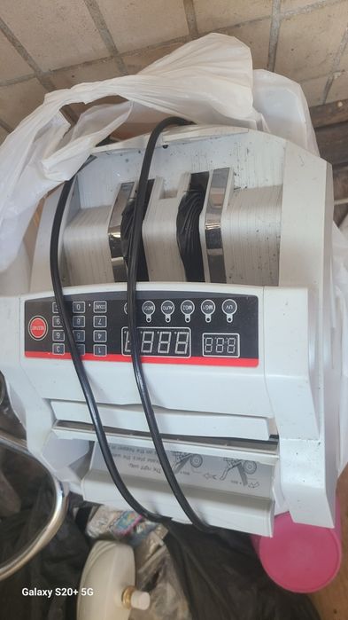 Счётная машина для денег.