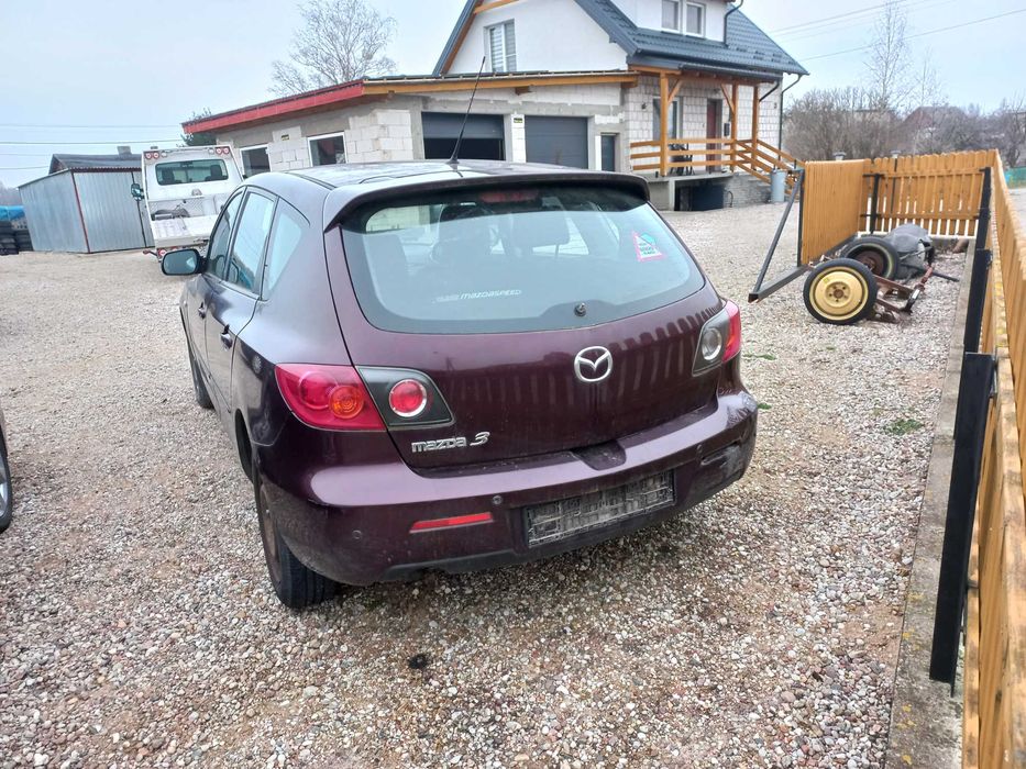 Klapa zderzak blotnik lampy pas mazda 3