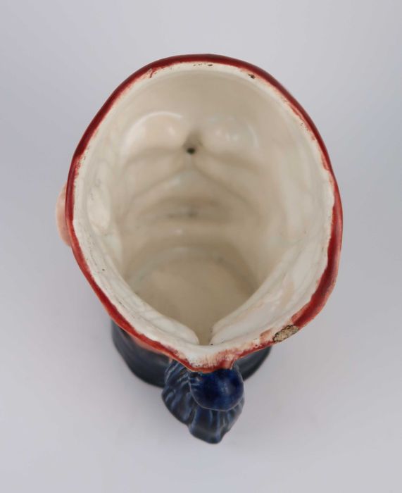 Caneca antropomórfica muito antiga em faiança