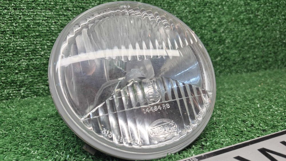 BMW 3 E30 / 6 E24 1975.1993 - ÓTICA/FAROL FRENTE ORIGINAL HELLA - NOVA