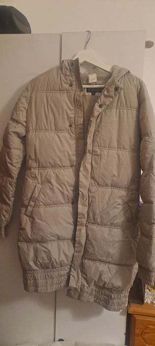 Casaco de penas comprido