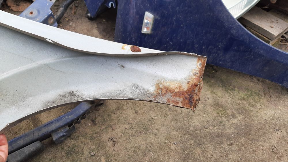 Lak. Z157 błotnik prawy przedni Opel Astra H III
