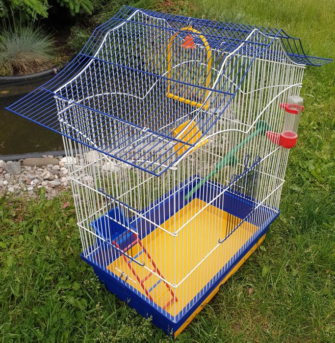 Клітка для птахів. Б/в. В гарному стані. З наповненням, як на фото.