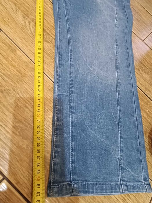 Spodnie 7/8 jeansy damskie niebieskie 44