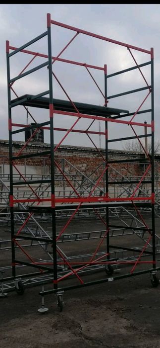 Аренда  строительные леса вышка тура передвижные высота  любая