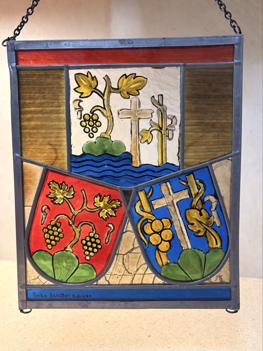 Beautiful stained-glass window with religious motifs, hand-painted enamel glass with tin frame