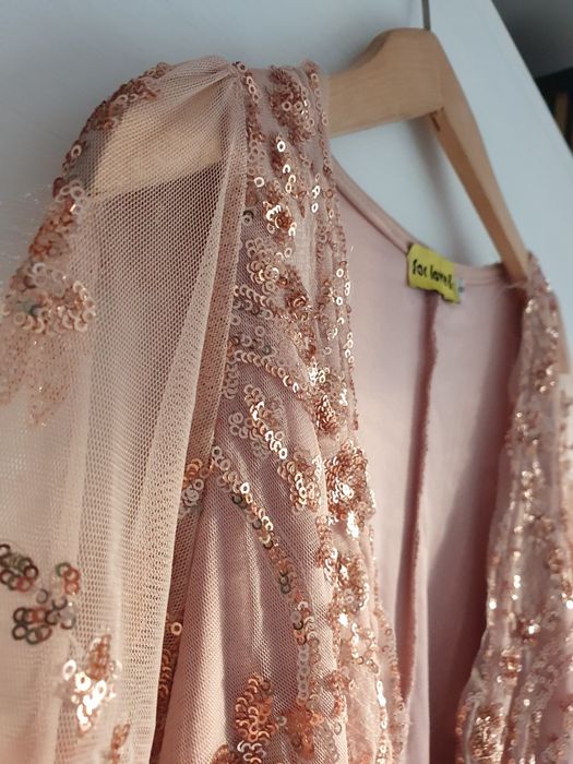 Piękny kombinezon w cekiny