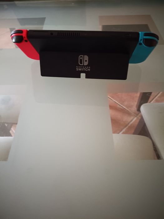 Nintendo Switch Oled Como Nova Com Quatro Jogos De Oferta