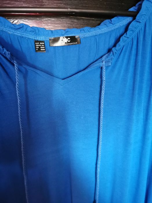 Bluzka z dekoltem wiązanym niebieska