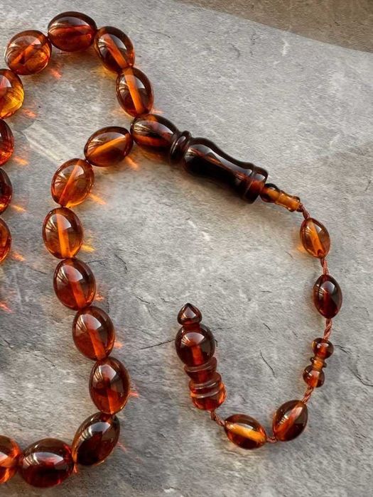 Piękny różaniec z bursztynu, Nowy