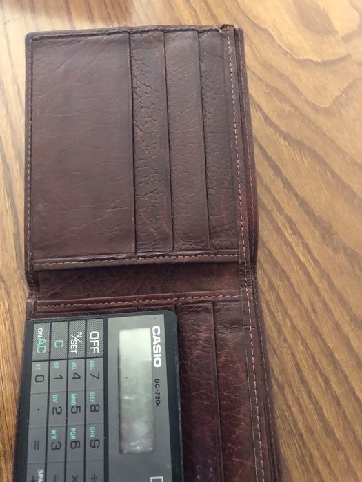 Carteiras e porta moedas em pele