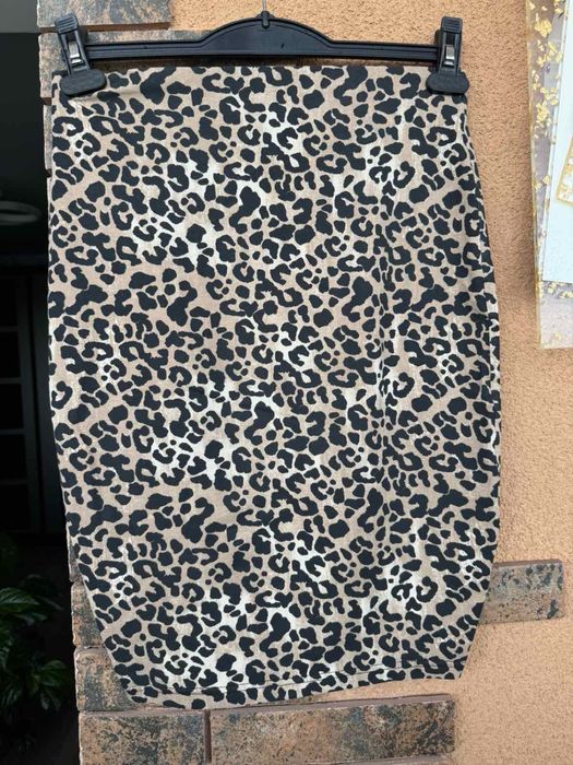 Юбки экокожа, чёрные и змеиный принт