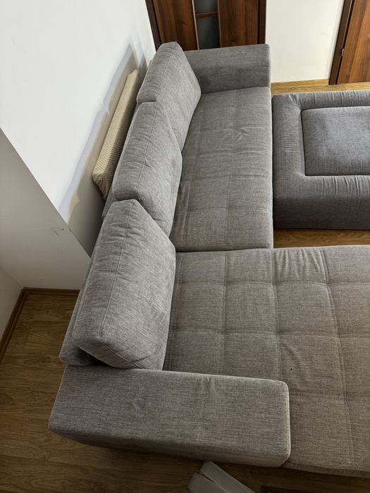 Szary duży narożnik z dostawianą pufą