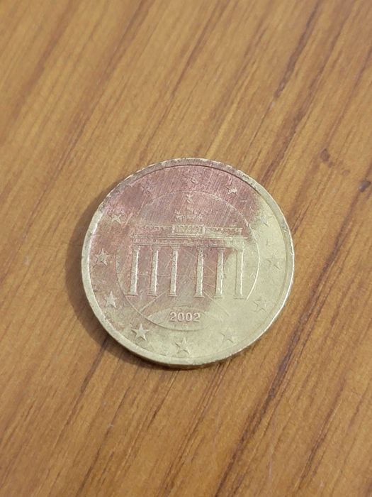 Moeda de 50 cêntimos com defeito na composição do metal