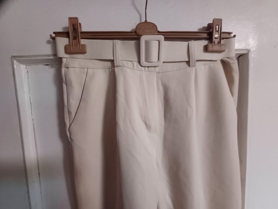 Spodnie letnie w kolorze beżu rozm.L/XL