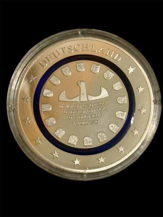 Medalha em prata comemorativa do planeta terra