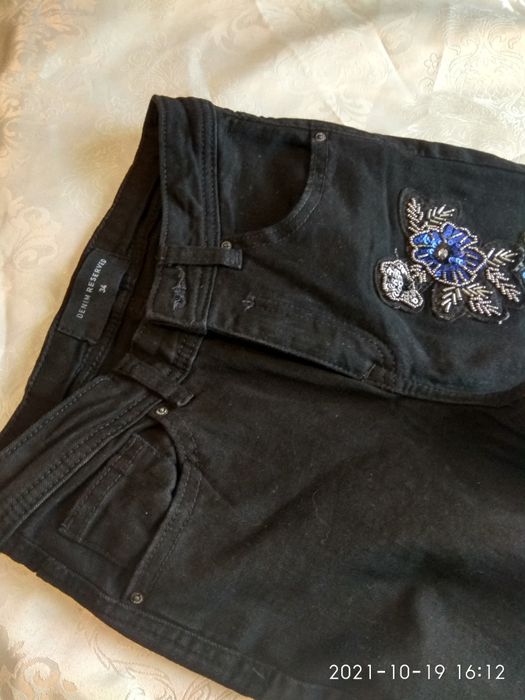 Spodnie czarne z Reserved