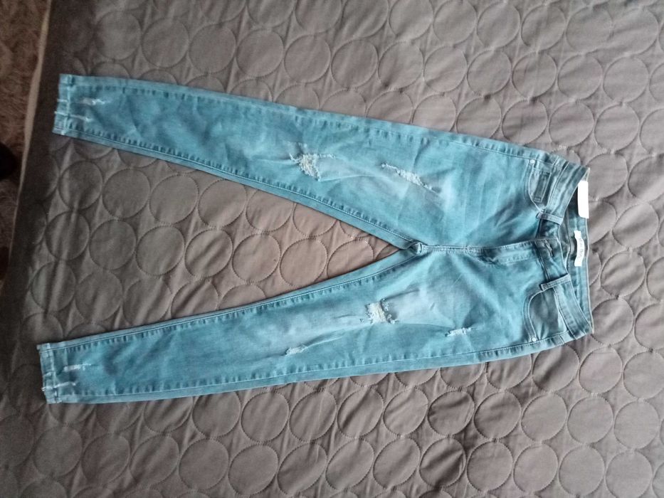Spodnie jeans. Jeansy nowe przetarcia. Rozmiar 38