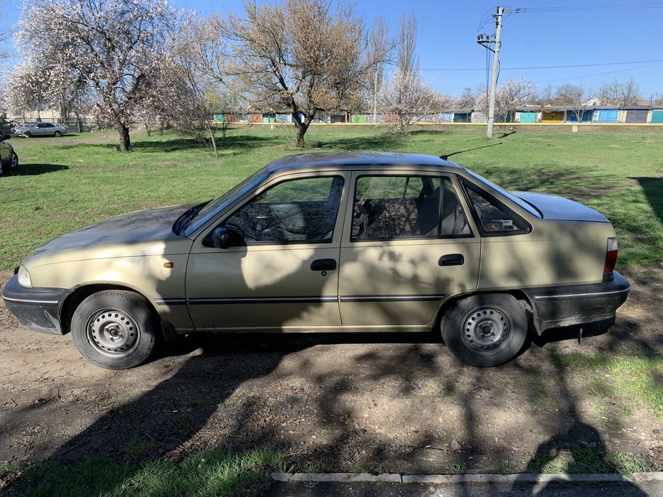 Продам  нексию срочно