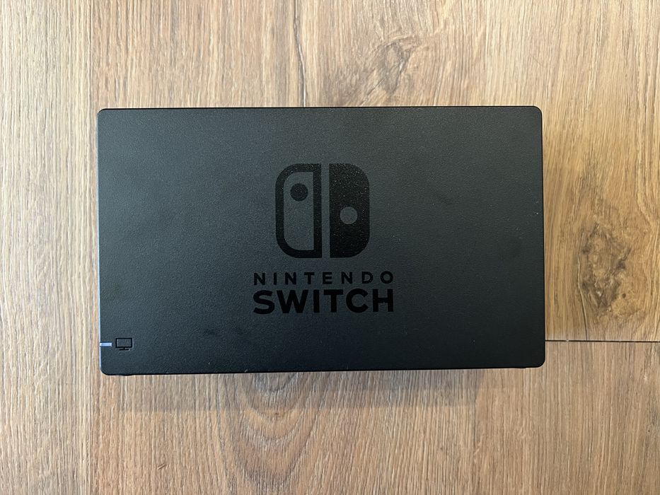 Nintendo Switch, remote and 3 games